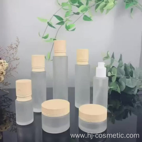 High-grade Cosmetic transparent Frosted glass bottles/jars with wood grain cap